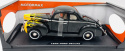 Ford Deluxe 1940 1:18 model Motormax 73108 czarny żółte płomienie