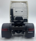 MAN TGX ciągnik siodłowy model WELLY 32650 metal 1:32 biały