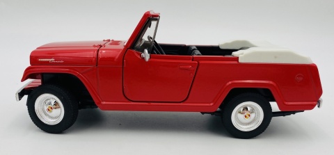 Jeep Jeepster Commando Roadster 1967 model 24117 Welly 1:24 czerwony