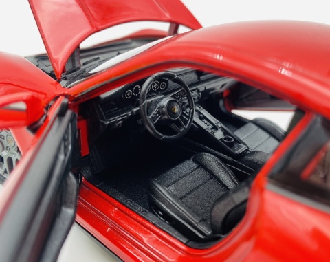 PORSCHE 911 (992) Carrera 4S 2020 model 24099 WELLY 1:24 czerwony