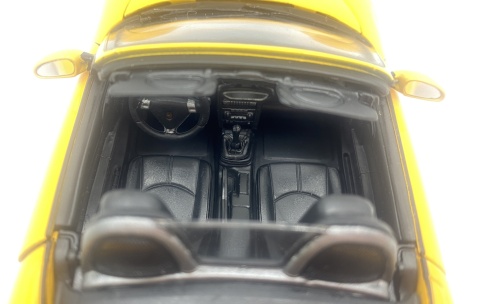 PORSCHE 987 Boxster 2012 model 22479 metal WELLY 1:24 żółty