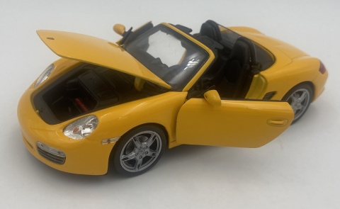 PORSCHE 987 Boxster 2012 model 22479 metal WELLY 1:24 żółty