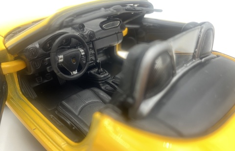 PORSCHE 987 Boxster 2012 model 22479 metal WELLY 1:24 żółty