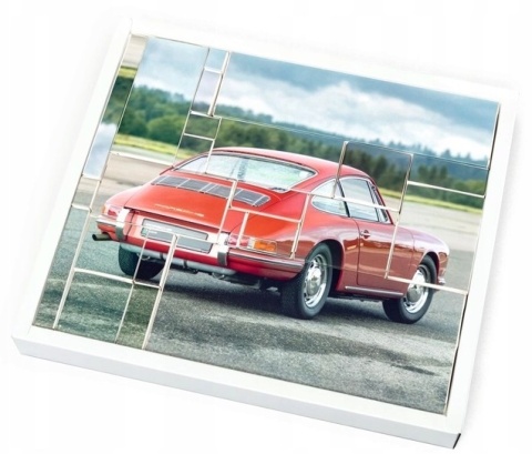 Porsche 911 z deską surfingową kalendarz adwentowy 1:43 żółty Franzis 1:43