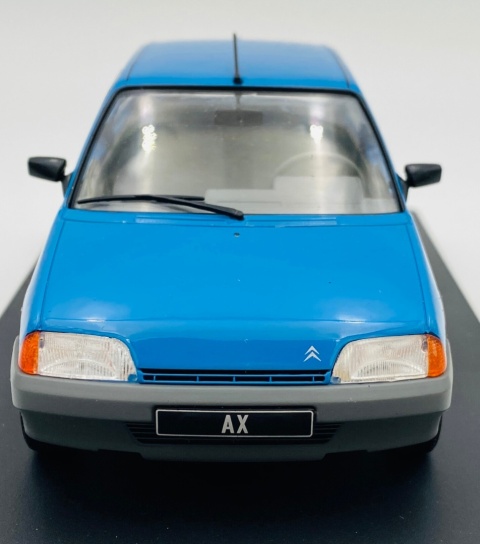 Citroen AX 1986 model 124256 WhiteBox 1:24 niebieski