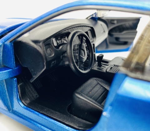 DODGE Charger SXT 2023 model 1:24 Motormax 79387 niebieski