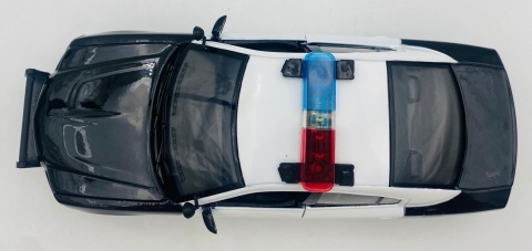 Dodge Charger Pursuit 2011 biały/czarny światło/dźwiek 1:24 Motormax 79533