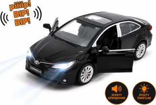 Toyota Corolla Hybrid z napędem światło dźwięk METAL 1:33 MSZ 68432 czarny