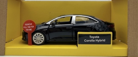 Toyota Corolla Hybrid z napędem światło dźwięk METAL 1:33 MSZ 68432 czarny