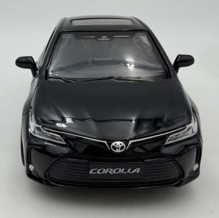 Toyota Corolla Hybrid z napędem światło dźwięk METAL 1:33 MSZ 68432 czarny