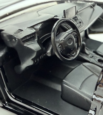Toyota Corolla Hybrid z napędem światło dźwięk METAL 1:33 MSZ 68432 czarny