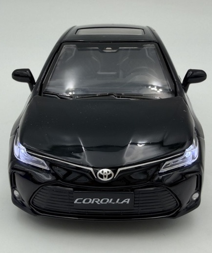 Toyota Corolla Hybrid z napędem światło dźwięk METAL 1:33 MSZ 68432 czarny