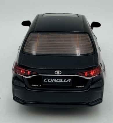 Toyota Corolla Hybrid z napędem światło dźwięk METAL 1:33 MSZ 68432 czarny