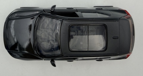 Volvo EX40 z napędem światło dźwięk model METAL 1:32 MSZ 68411 czarny