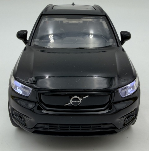 Volvo EX40 z napędem światło dźwięk model METAL 1:32 MSZ 68411 czarny
